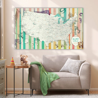 a living room with a couch and a map on the wall