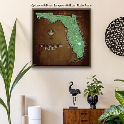 a push pin map of the state of florida hangs on a wall