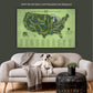 a dog sitting on a couch in front of a map of the united states