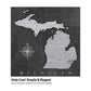 a black and white map of michigan with a compass