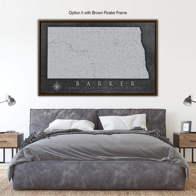 a bedroom with a large bed and a framed map